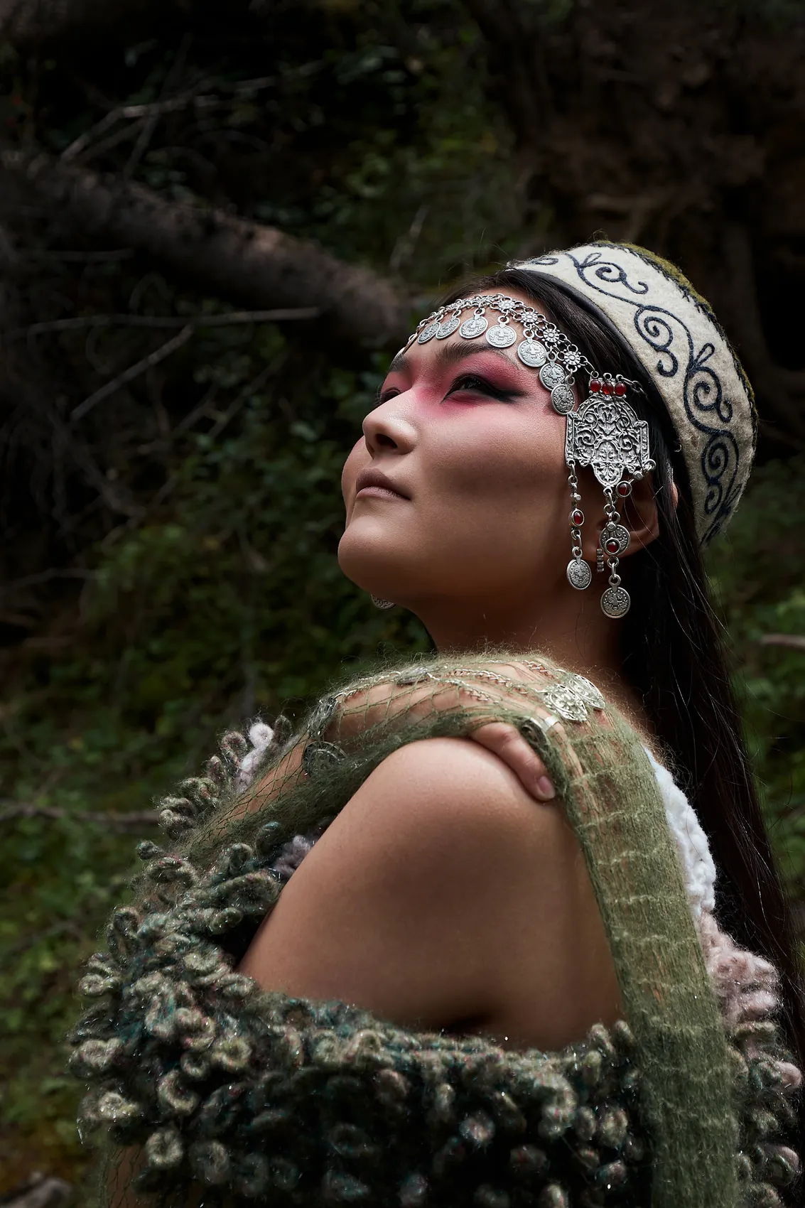 Model looking up, knit across the shoulders
